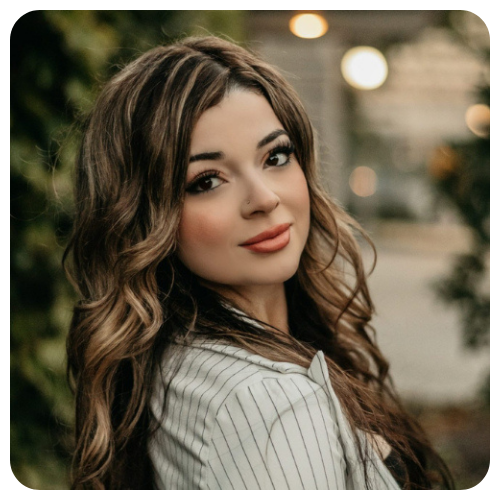 Hajer-Furat-smiling-wearing-black-stripe-white-blouse1