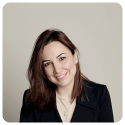 Lina-Jarkas-smiling-wearing-black-jacket-over-white-shirt1