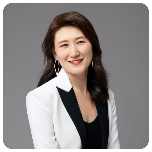 Luyi Liu smiling wearing a black collar and white jacket with a black shirt.