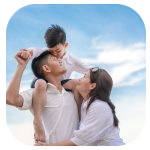 happy family of three outside smiling with a little boy sitting on his dad's head and his mom is hugging his dad. happy family of three outside smiling with a little boy sitting on his dad's head and his mom is hugging his dad.