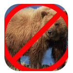 A photograph of a brown bear standing on grass with a blue sky in the background. Overlaid is a red prohibition symbol, indicating that bears are not allowed or are to be avoided. A photograph of a brown bear standing on grass with a blue sky in the background. Overlaid is a red prohibition symbol, indicating that bears are not allowed or are to be avoided.