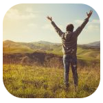 A man with hands stretched out in nature. A man with hands stretched out in nature.